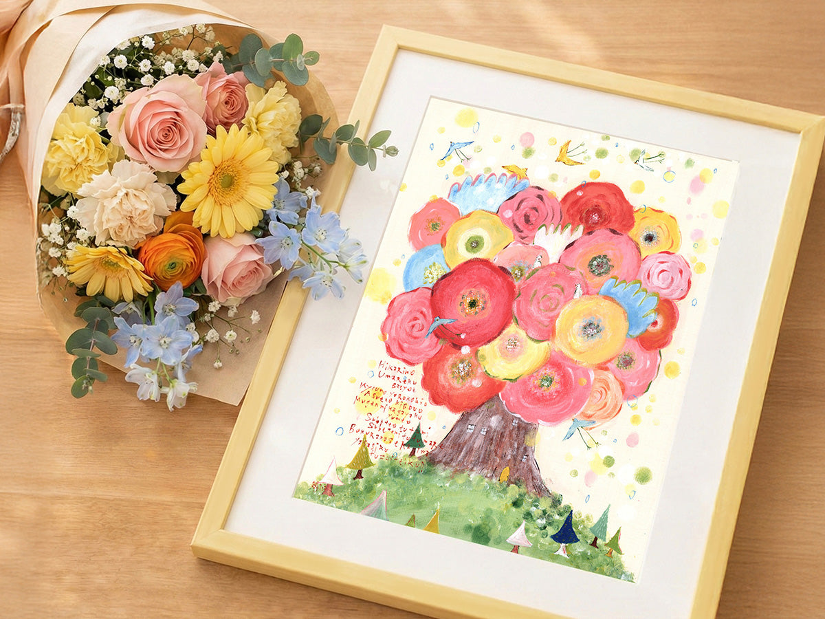 花を添えた額装作品「咲きつづく日々」