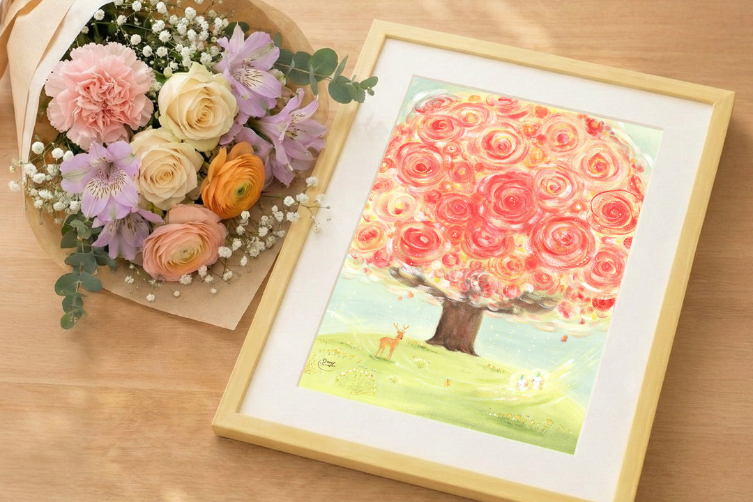 花束と並べて置いた額装作品「いのちの樹」
